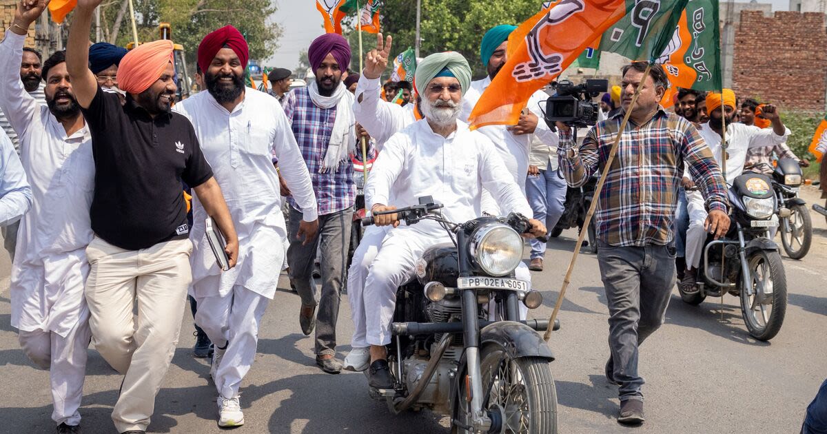 Indian democracy roars ahead on a Royal Enfield at blistering rural rally