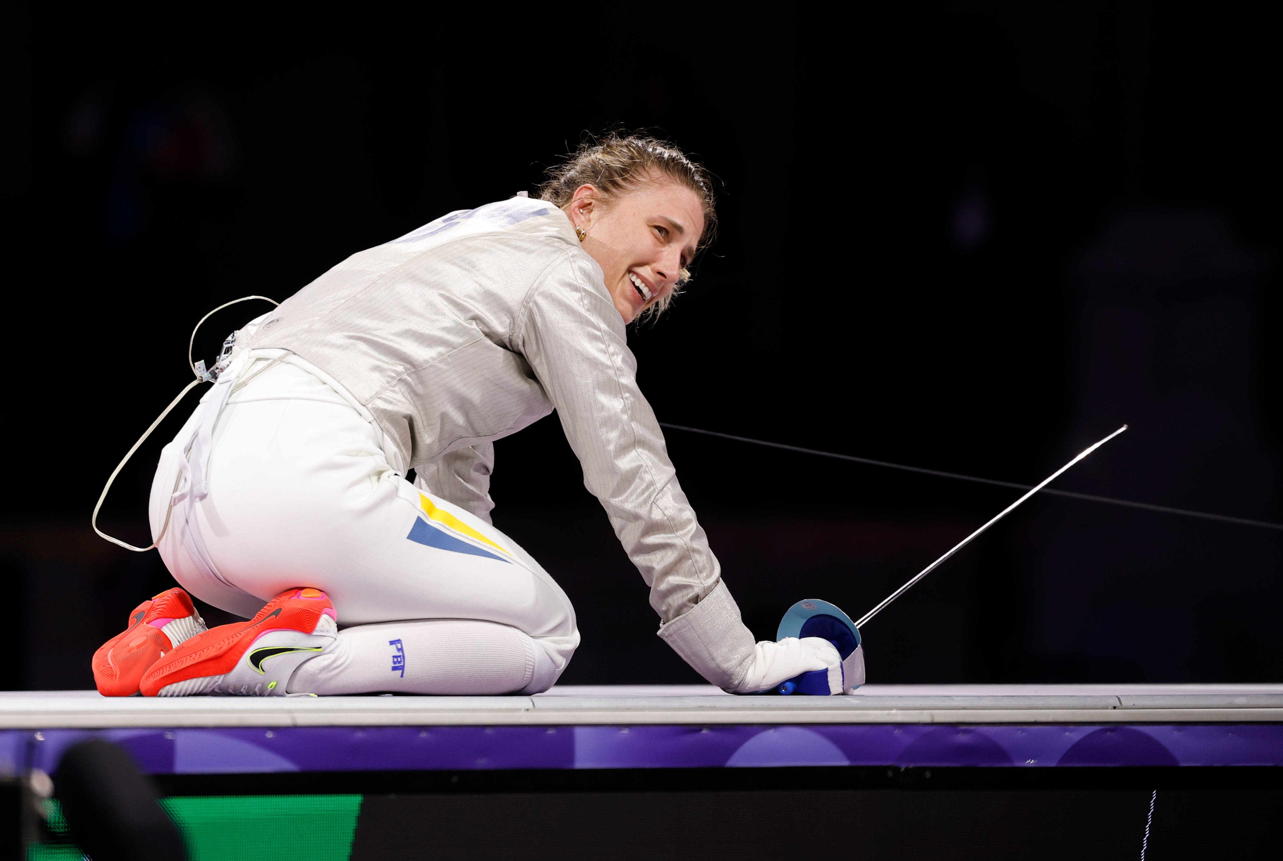 Fencer wins Ukraine's first Olympic medal in Paris. 'It's for my country.'