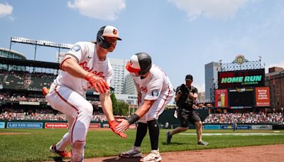 Orioles end losing streak with assist from Yankees in crazy 9th inning