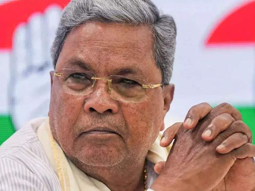 BJP releases papers to claim illegalities in Karnataka CM Siddaramaiah's wife case | India News - Times of India