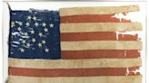 A 19th century flag disrupts leadership at an Illinois museum and prompts a state investigation