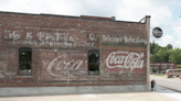 Over 100-year-old Neosho Coca-Cola mural receives some restoration