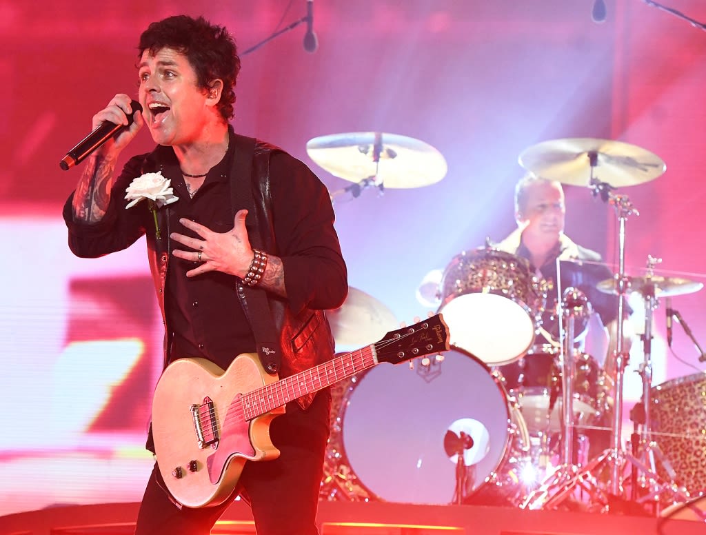 Green Day lead singer Billie Joe Armstrong spray-paints over A’s logo at Toronto Blue Jays ballpark