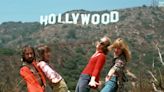 Photos show the Hollywood sign's transformation from a temporary billboard to an iconic landmark