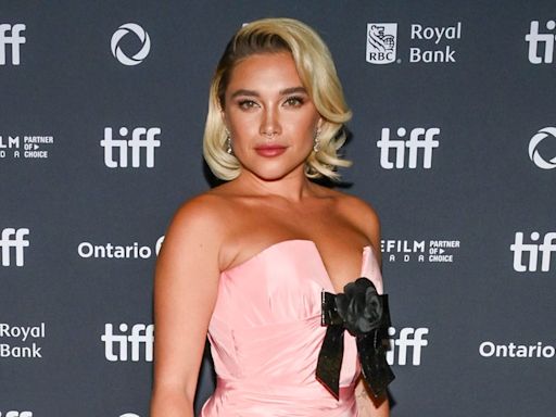 Florence Pugh Arrives in Classic Pastel Pink Ballgown at the TIFF “We Live in Time” Red Carpet