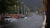 Tropical Storm Ernesto nears hurricane strength as it skirts Puerto Rico, bringing concerns of floods and power outages