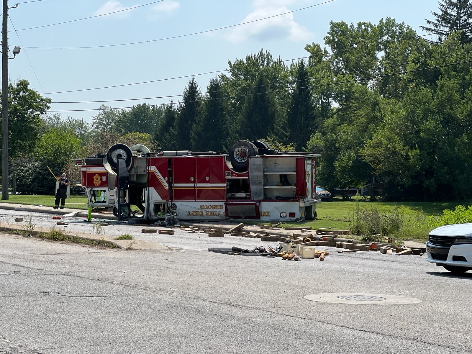 IFD firetruck crashes while responding to fatal east side accident; 4 firefighters injured