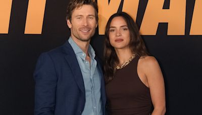 Glen Powell Talks Leaving 'Fake' Hollywood, As Hit Man Costar Adria Arjona Details 'Pain' Filming Sex Scenes