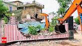 Rajasthan paper leak: Illegal structures of kingpin’s house demolished | Jaipur News - Times of India