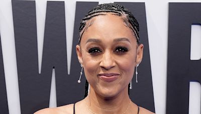 Tia Mowry stuns in a floral black gown at the BET Awards 2024