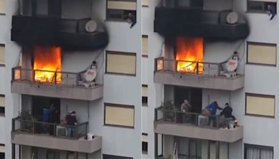 Menino de seis anos é resgatado da varanda de apartamento em chamas