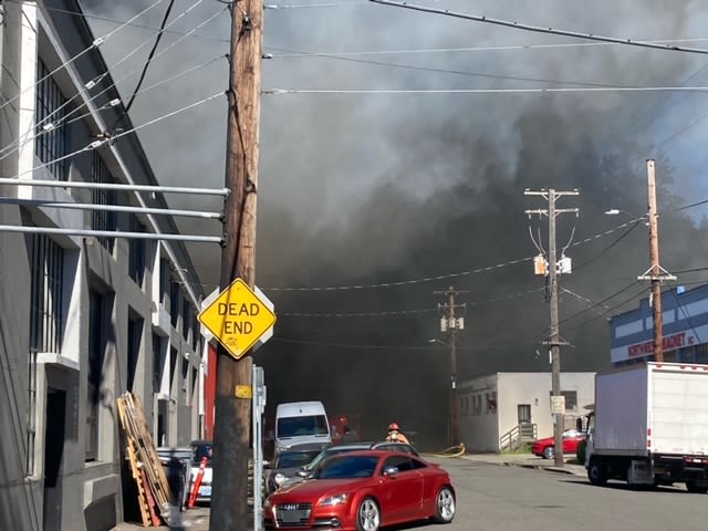 Shin Shin food factory a total loss after grease fire, still smoldering