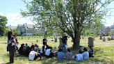 Rev. Ken Postle explains the significance of the Civil War to a group of eighth graders