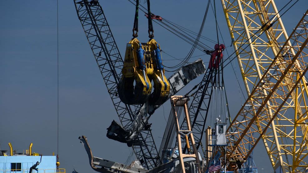 Large crane removes wreckage from Francis Scott Key Bridge collapse