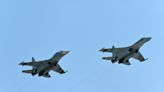 Russian fighter jet 'released a missile' near unarmed British surveillance plane, U.K. defense secretary says