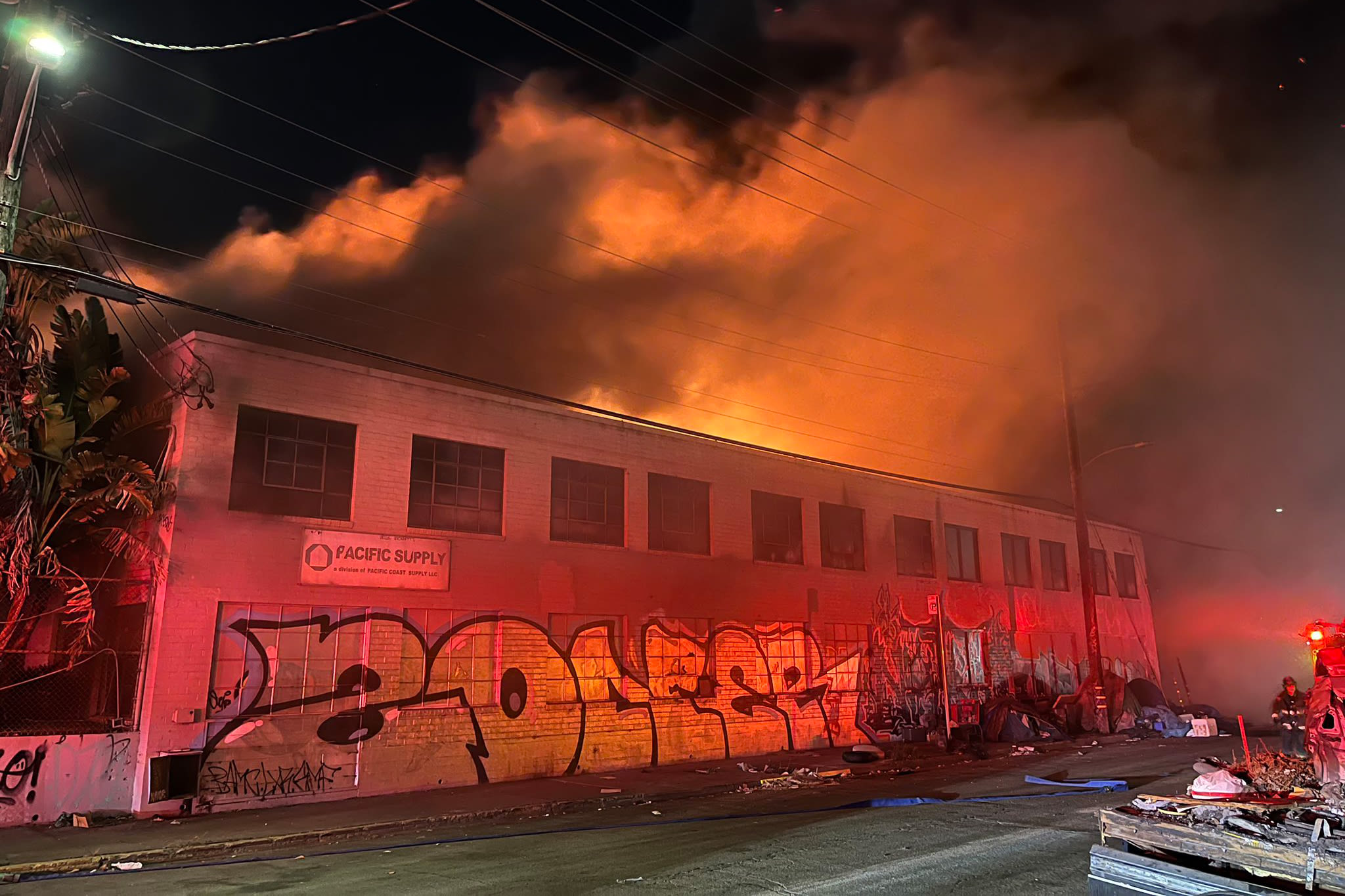 'Building will be a total loss': 70 firefighters battle Oakland warehouse fire