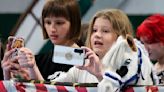 AP PHOTOS: Russian kids ride sticks with a horse's head in hobby horsing competition