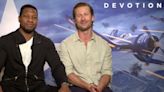 ‘Devotion’ Stars Jonathan Majors and Glen Powell on Building Camaraderie in a Bathhouse: ‘In It With Me, Thick and Thin’