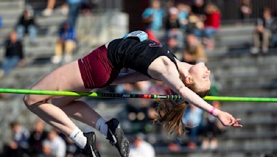 Two schools, two school records in the high jump for Sydney Maue