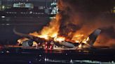 Five people killed after two planes crash at Japan's Haneda Airport