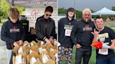 Guy Fieri and His Sons Serve Over 500 Meals at the Special Olympics in Northern California