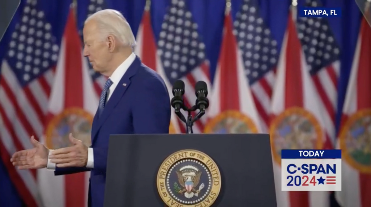 Fact Check: Video Supposedly Shows Biden Trying to Shake Hands with a 'Ghost' on Stage. Here's the Truth