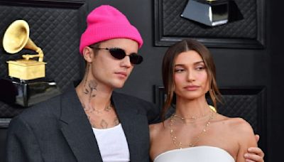 Justin Bieber Kisses Pregnant Wife Hailey Bieber While Tenderly Cradling Her Baby Bump: WATCH