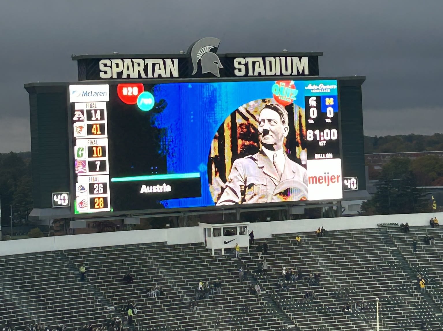 Quiz show creator sues MSU for stealing content & blaming him for Hitler image at UM game