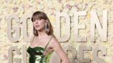 Taylor Swift makes the whole place shimmer in sparkly green on the Globes red carpet