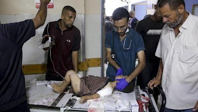 Israeli strikes in central Gaza kill 20 Palestinians as mediators make new push on cease-fire deal