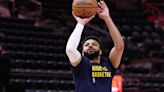 Nuggets thrash Jazz, retain share of West lead