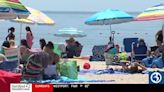 Families cool off at Sound View Beach in Old Lyme