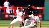 Braves rally for seven in the eighth to begin defense of NL East crown with 9-3 win over Phillies