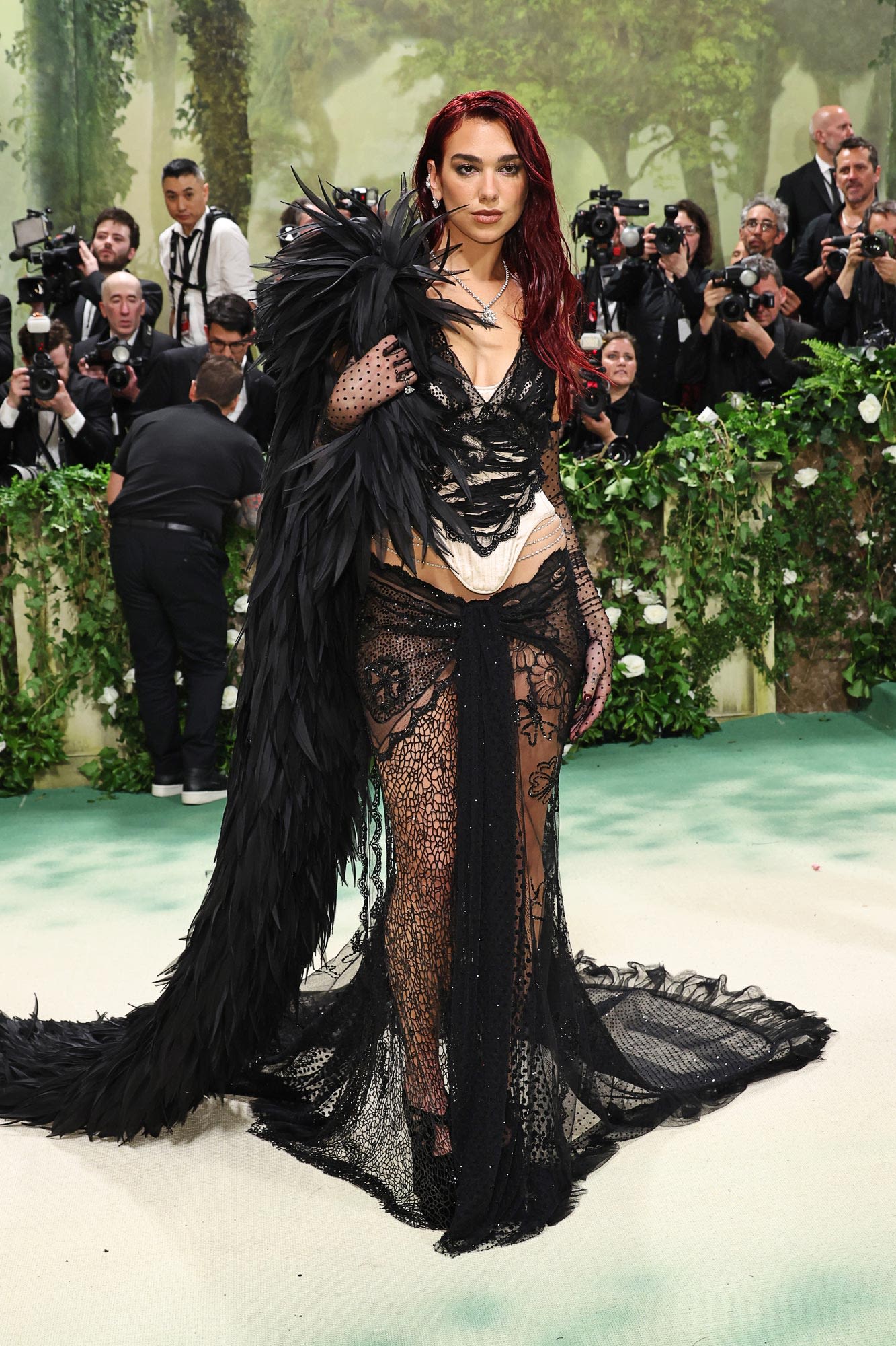 Dua Lipa Dominates the 2024 Met Gala Red Carpet in All-Black Ensemble