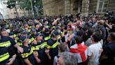 Georgian lawmakers move closer to passing 'Russian law' targeting the media. Protesters gather again