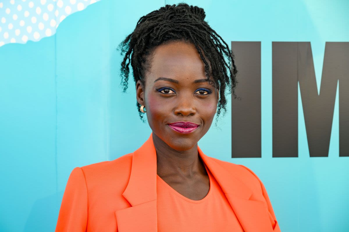 Lupita Nyong'o Celebrates Her Orange Cat's Birthday With Color Coordinated Photo Shoot