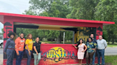 Southern University Lab School students help turn old bus stop into art