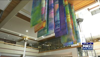 New Artwork from Renowned Artist Hangs from the Ceiling in the Holiday Center Atrium - Fox21Online