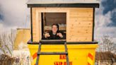 An artist's tiny home inside a dumpster is blowing up on TikTok as people question the practicality of his solution to unaffordable rent