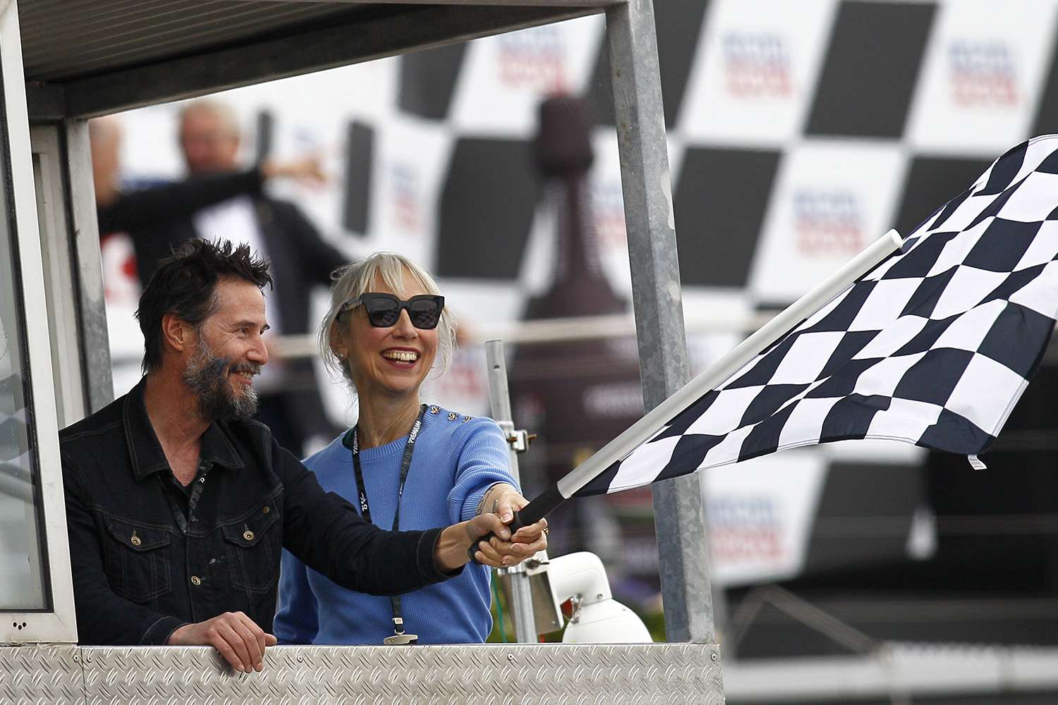 Keanu Reeves and Girlfriend Alexandra Grant Make Rare Appearance at Motorcycle Race in Germany