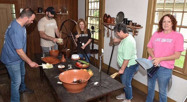 750 Day of Caring volunteers work through rainy weather to make an impact