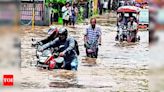 Protest against urban floods outside GMDA office | Guwahati News - Times of India