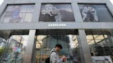 Samsung reports improved profit as its chip business losses narrow