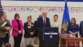 Wisconsin Gov. Tony Evers cites rise in hate crimes before signing bill to require schools teach about Hmong Americans.