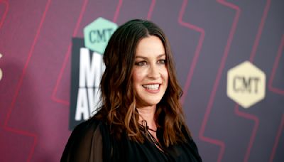 Alanis Morissette says she felt like she was 'slowly dying' amid postpartum depression: 'It's like your whole self disappears'