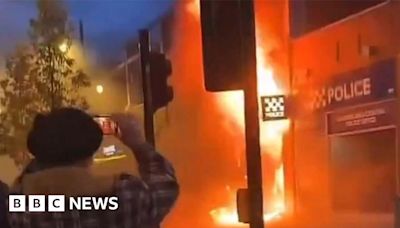 Sunderland protesters attack police office and set car alight