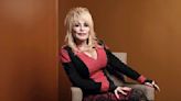 Dolly Parton reveals her preacher grandfather 'whipped' and 'scolded' her for her fashion choices