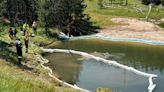 5 people escape hot, acidic pond after SUV drove into inactive geyser in Yellowstone