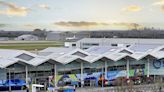 'Get there three hours before if you want food and a drink' – Fuming airline passengers queue outside entrance to Birmingham Airport