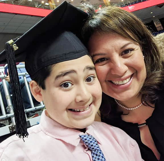 WestConn honors Danbury teacher’s Mother’s Day wish to share graduation stage with her son